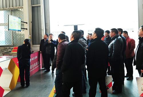 Business elite visiting the company's new products and European crane Internet of things intelligent monitoring system